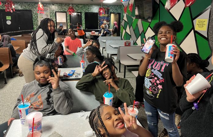 Students enjoying snack bar at Royal Skateland